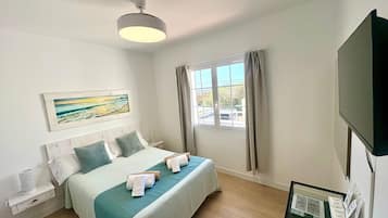 3 slaapkamers, een strijkplank/strijkijzer, gratis wifi, beddengoed