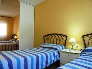 1 dormitorio y ropa de cama