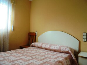 1 dormitorio y ropa de cama