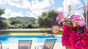 A poolside area with lounge chairs and a view of a swimming pool. - Finca Na Bona · Finca Na Bona. Perfect location. Menorca (Mahón)