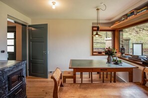 Enjoy meals in the dining area with a view, equipped with an oven for convenient cooking.
