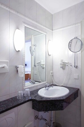 Hair dryer, towels, soap, toilet paper