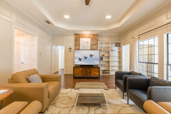 Smart TV, fireplace, foosball, books