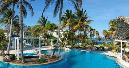 Intimate Beachfront Villa with Staff by ALOM Estates