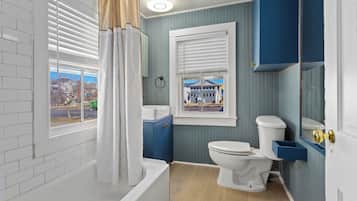 Combined shower/tub