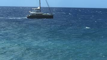 On the beach, sun loungers, beach towels