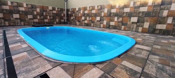 Piscina externa, piscina aquecida