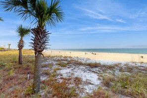 Enjoy a serene beach experience with calm waters and a tranquil atmosphere.
