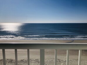On the beach, sun-loungers