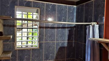Shower, hair dryer, towels, soap