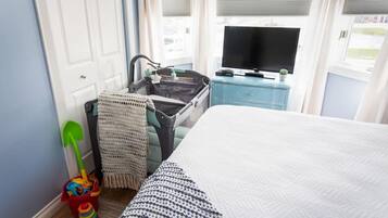 1 bedroom, desk, iron/ironing board, travel cot