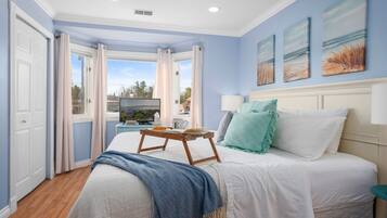 1 bedroom, desk, iron/ironing board, travel crib