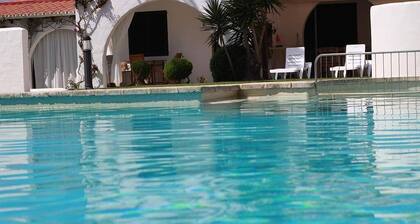 Bungalow (24) direct view, largest pool in the area and 60 meters from the sea