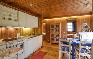 Fridge, stovetop, dishwasher, coffee/tea maker