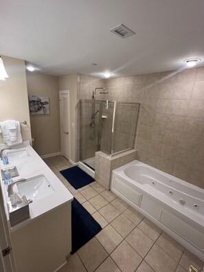 Shower, jetted bath, rainfall showerhead, hair dryer