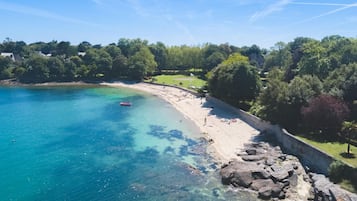 On the beach, sun-loungers