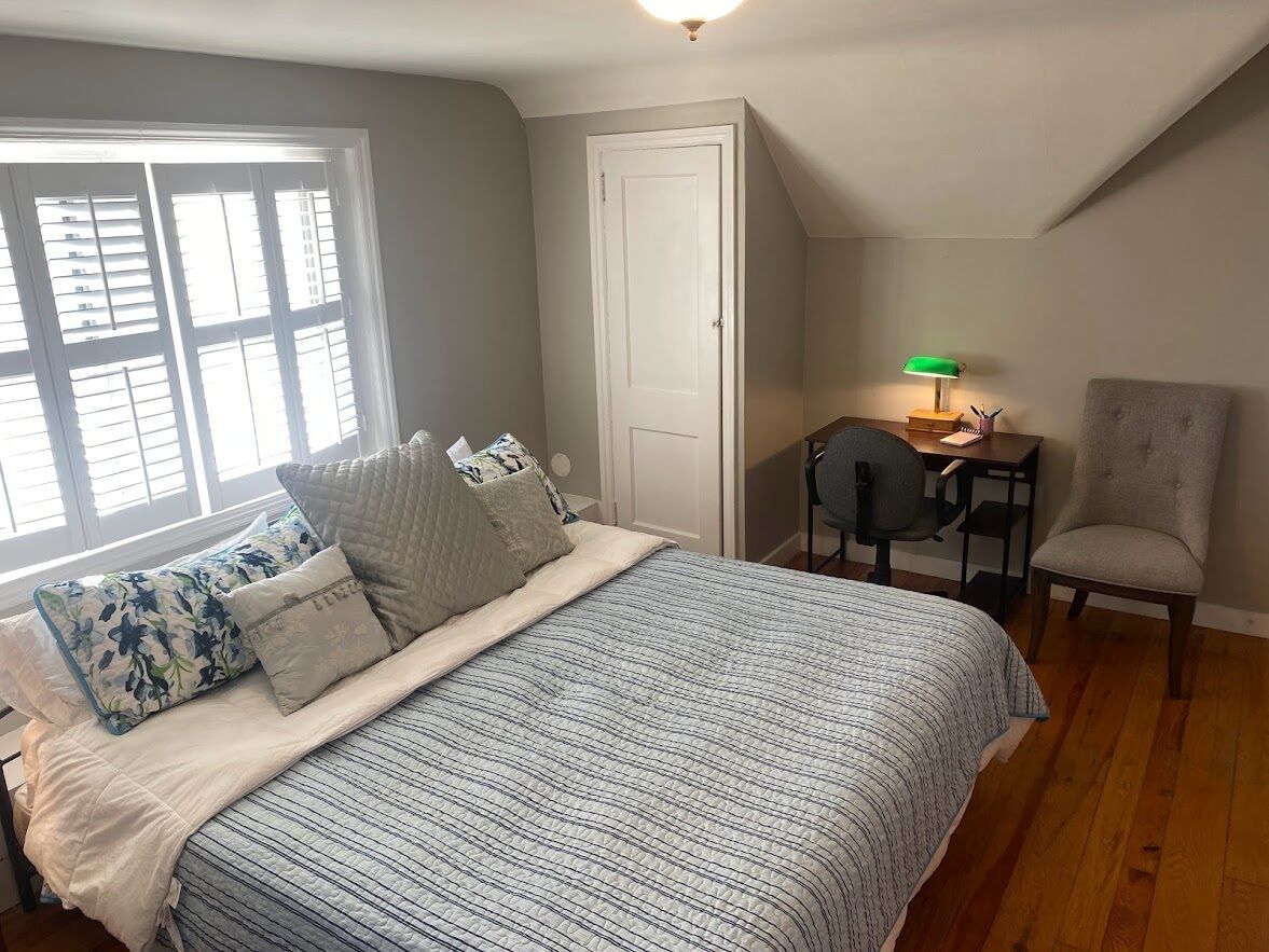 1 bedroom, desk, iron/ironing board, travel crib