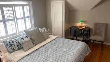 1 bedroom, desk, iron/ironing board, travel crib