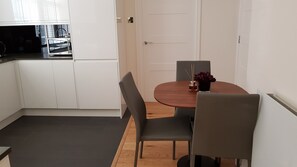 Full-size fridge, oven, dishwasher, cleaning supplies