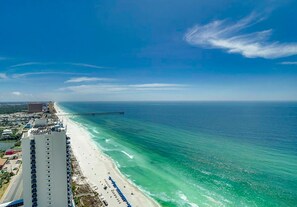 On the beach, sun loungers, beach towels