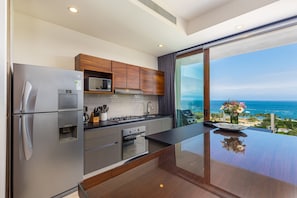 Open plan kitchen with ocean view