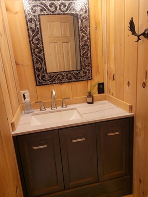 Bathtub, hair dryer, toilet paper