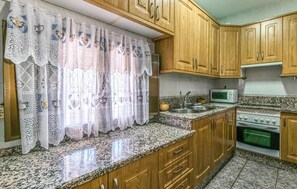 Fridge, microwave, cookware/dishes/utensils