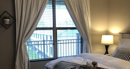Modern clean 2BR/2BA condo with patio & grill, in the heart of Okoboji, IA.