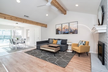 12' tall high ceiling living room with modern décor.