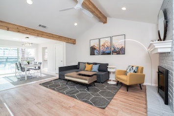 12' tall high ceiling living room with  modern décor.