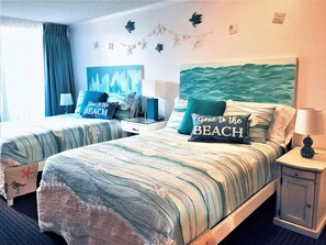 1 bedroom, desk, iron/ironing board, travel crib