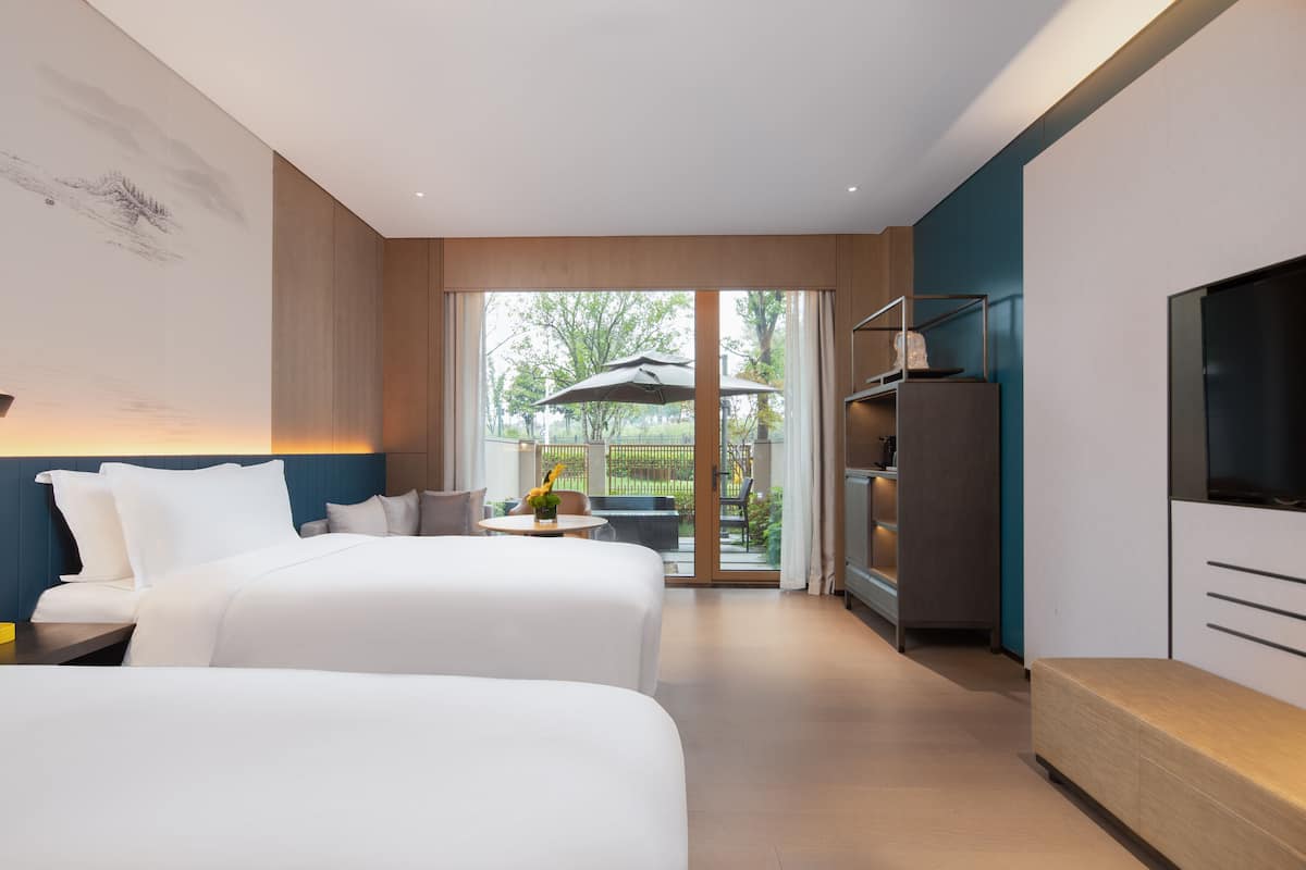 Mhub Courtyard Twin Room | 1 bedroom, minibar, in-room safe, blackout drapes