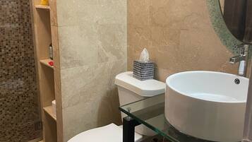 Shower, hair dryer, towels, soap