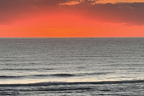 On the beach, sun loungers, beach towels