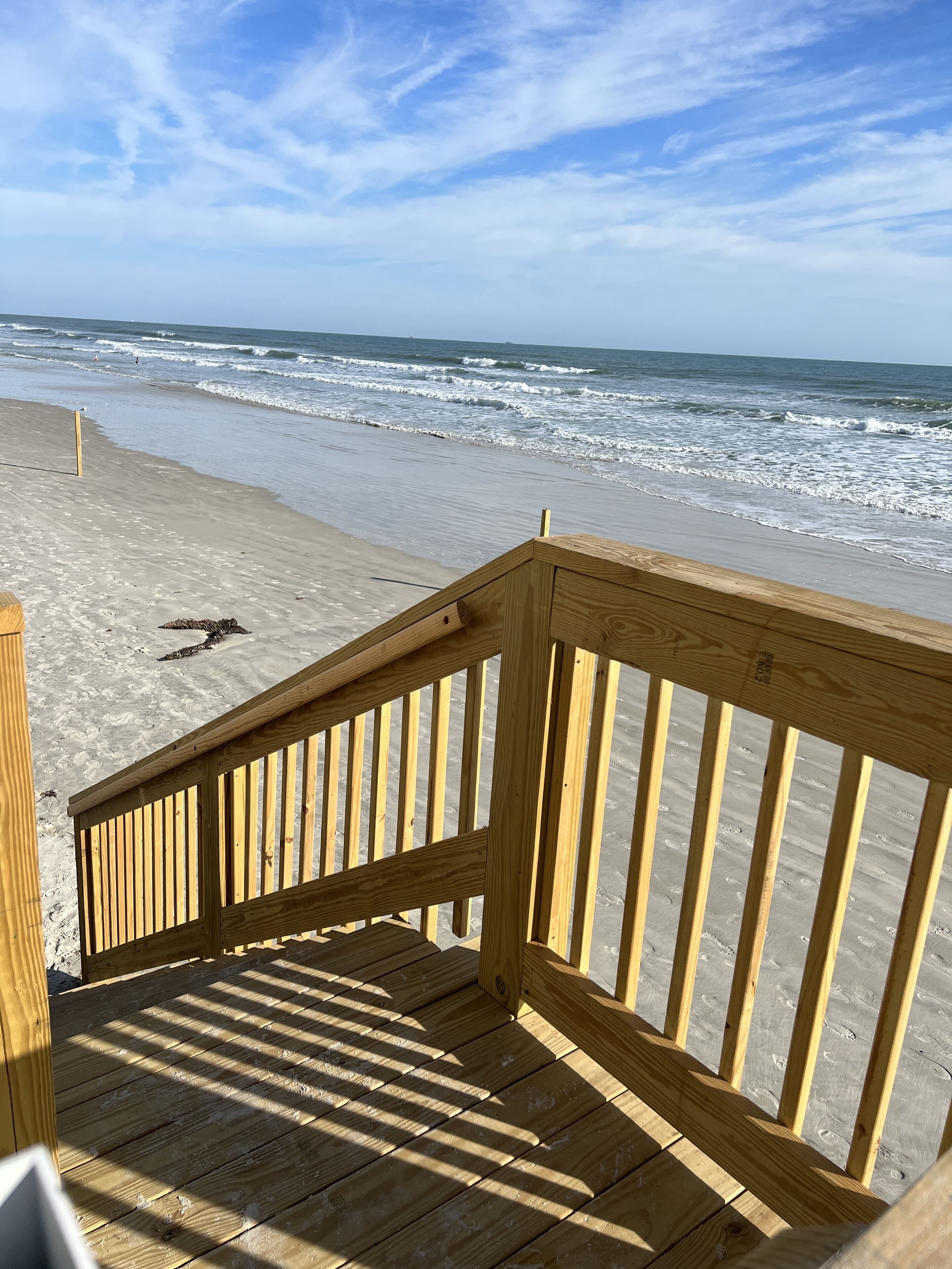 On the beach, sun loungers, beach towels