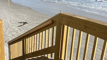 On the beach, sun loungers, beach towels