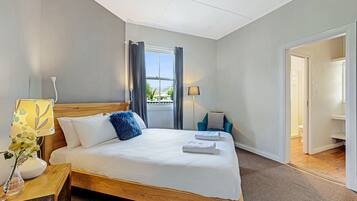 3 bedrooms, premium bedding, laptop workspace, iron/ironing board