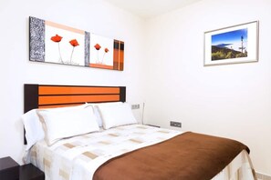 1 habitación, tabla de planchar con plancha, wifi gratis y ropa de cama 