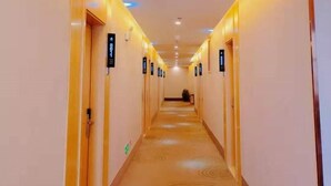 A hotel hallway with doors numbered 8611, 8612, and 8613. - Greentree Inn Yichun Development Zone Bus Terminal (Yichun)