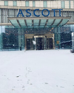 The entrance of a building with the name "ASCOTT" prominently displayed above the doors. - Ascott Xiangjiang FFC Changsha (Changsha)