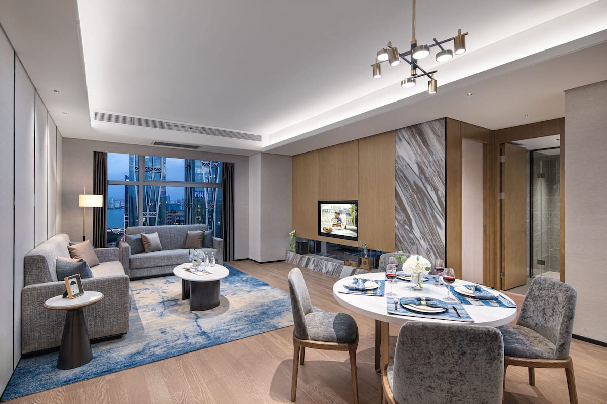 Executive Room, 3 Bedrooms | Living area | 50-inch TV with satellite channels