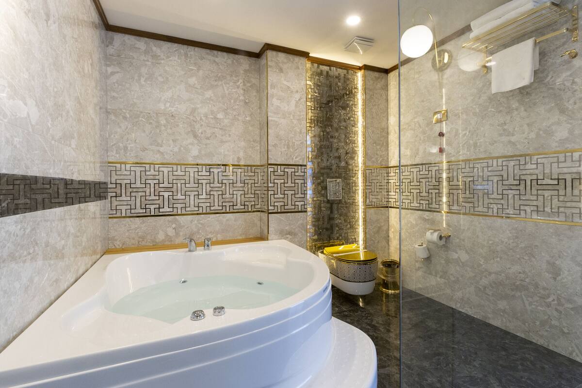 hair dryer, slippers, towels, soap