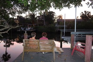 Enjoying a sunset drink on the dock - Winter retreat on the water in Florida sunshine!  Dock & pool are ready for you! (Bradenton)