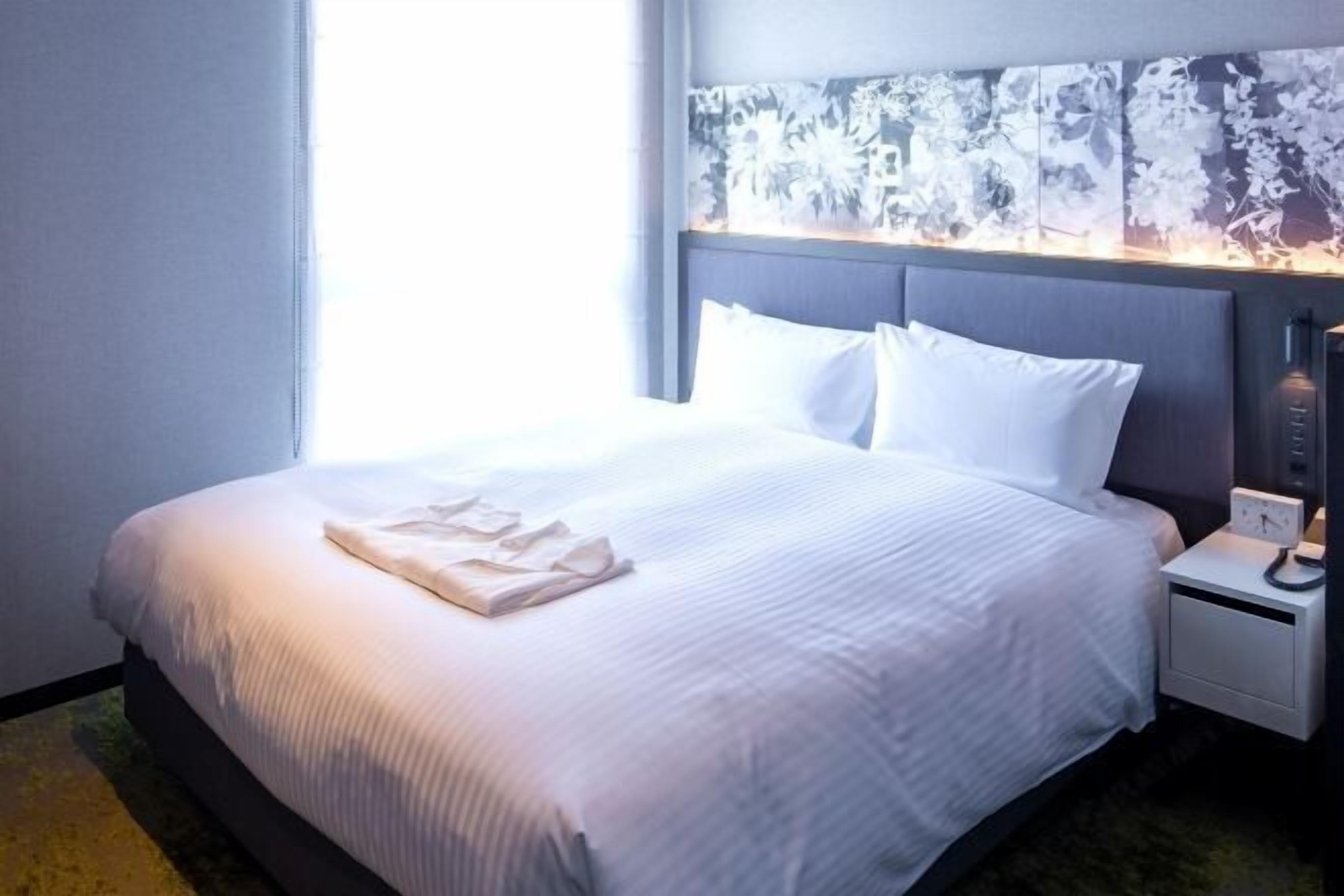 Blackout drapes, iron/ironing board, free WiFi, bed sheets