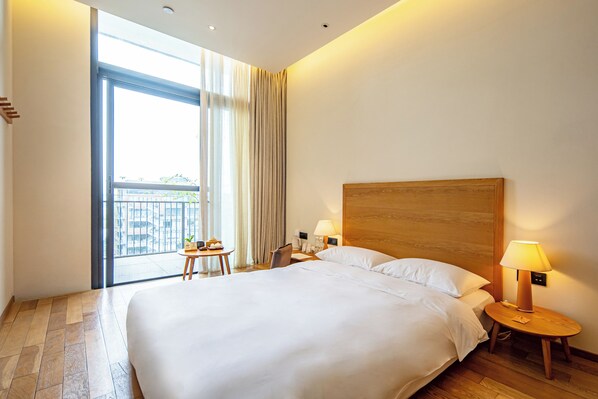 Chambre simple Deluxe | Coffre-fort, décor unique, rideaux d’obscurcissement