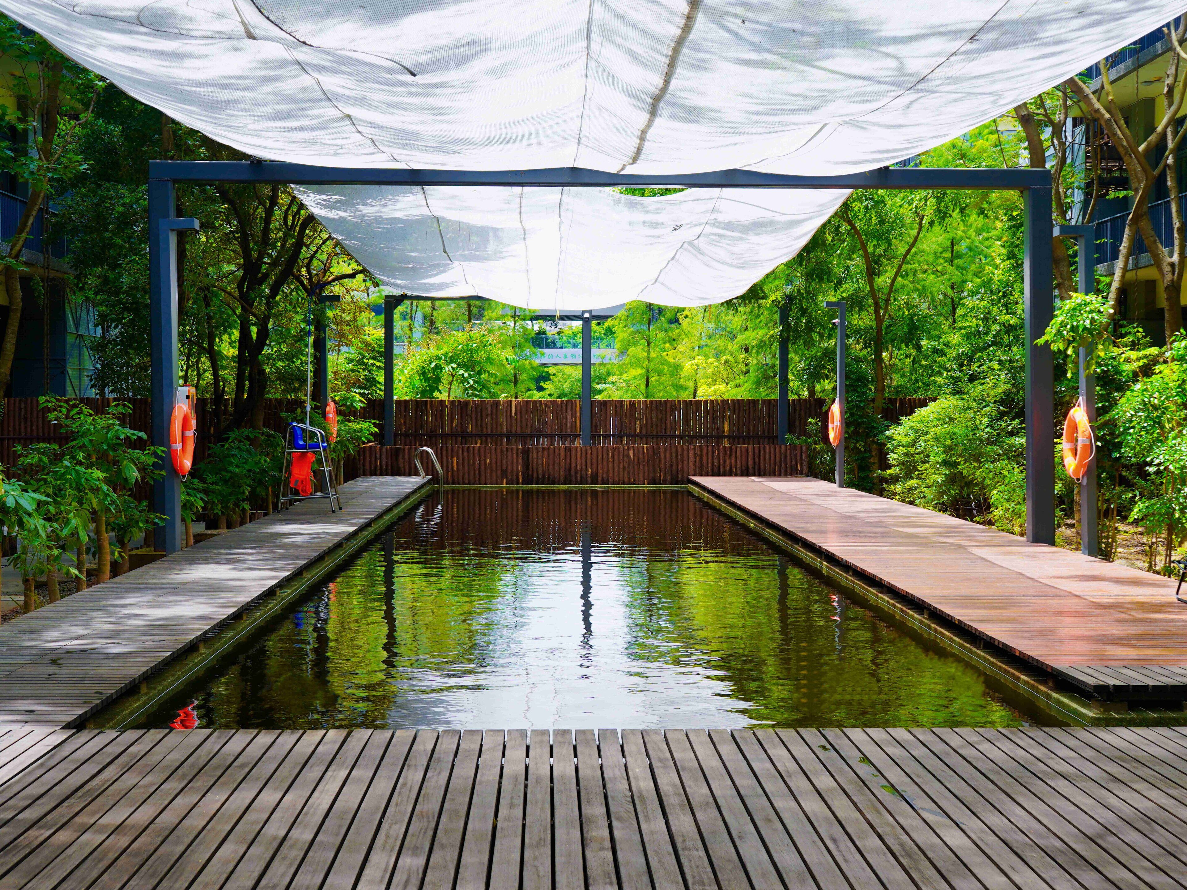 Outdoor pool, open 10:00 AM to 7:00 PM, pool umbrellas, pool loungers