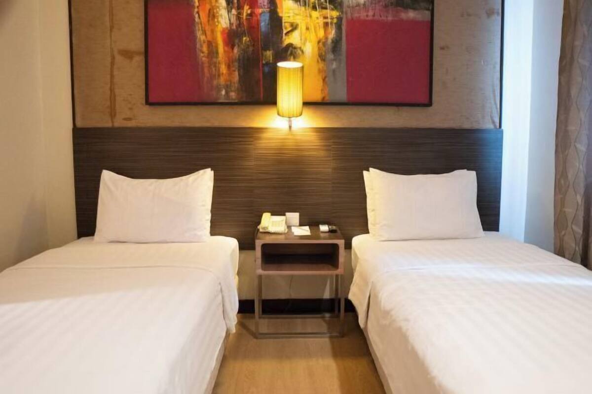 In-room safe, blackout curtains, bed sheets
