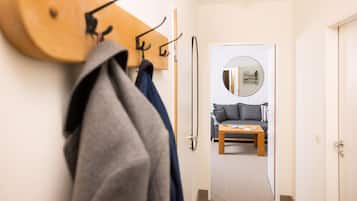 Deluxe Apartment | Living area | Flat-screen TV