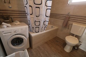 Apartment | Bathroom | Combined shower/bathtub, deep-soaking bathtub, hair dryer, towels - Stunning Apartment for 7 Close to Several Beaches (Vrsi)