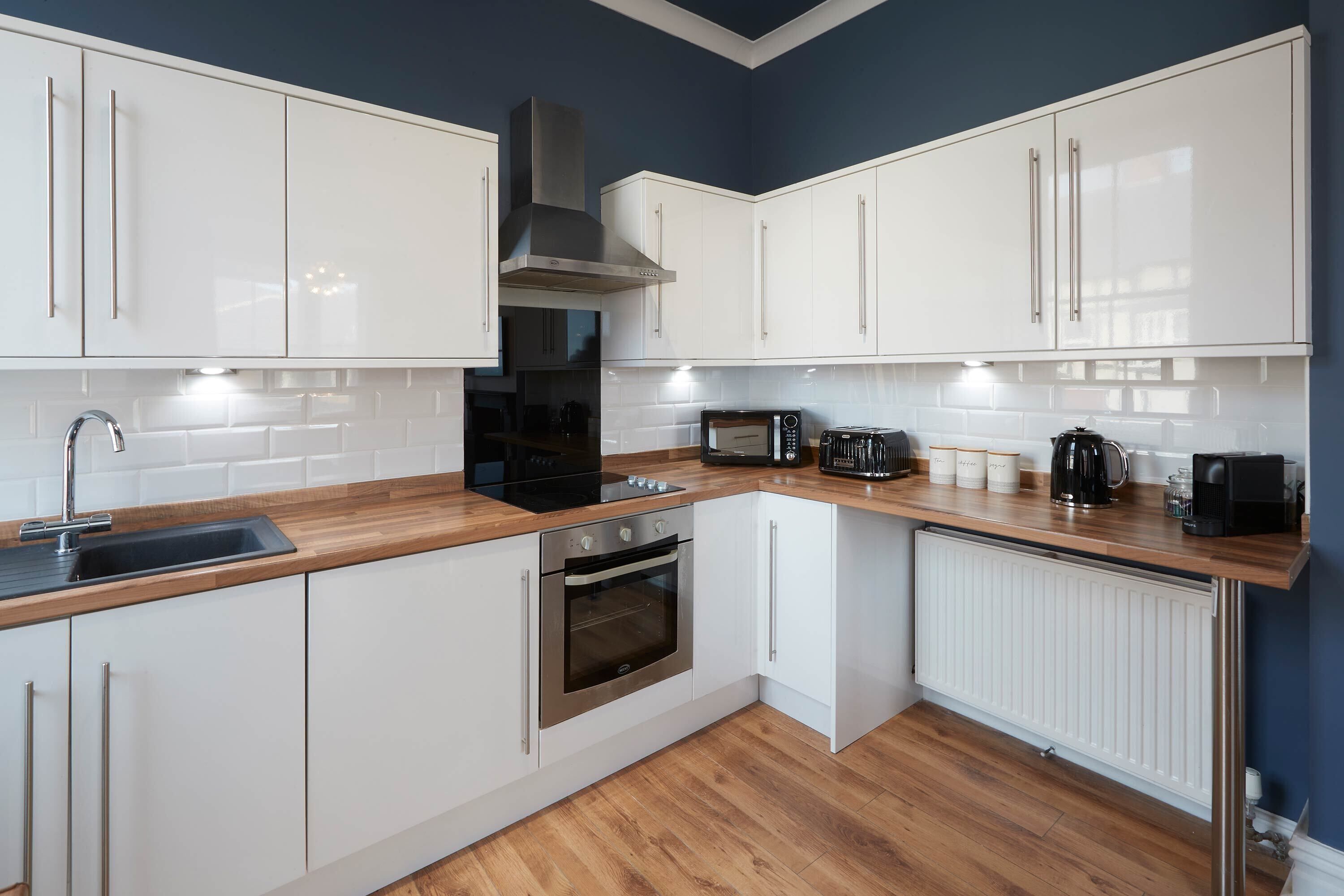 Apartment | Private kitchen | Full-size fridge, microwave, oven, stovetop